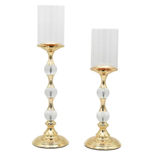 Πολυτελές σετ δύο κηροπηγίων που συνδυάζει το μέταλλο με το κρύσταλλο.