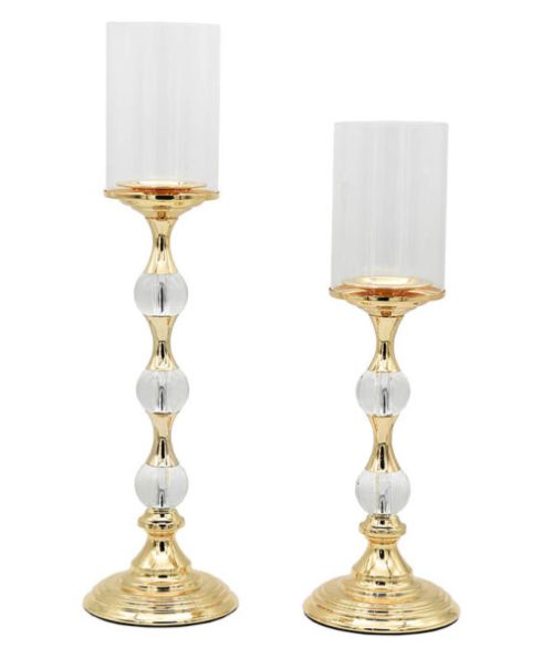 Πολυτελές σετ δύο κηροπηγίων που συνδυάζει το μέταλλο με το κρύσταλλο.
